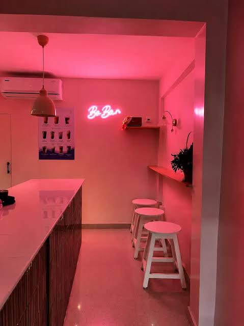 Bo Bar seating area and neon sign